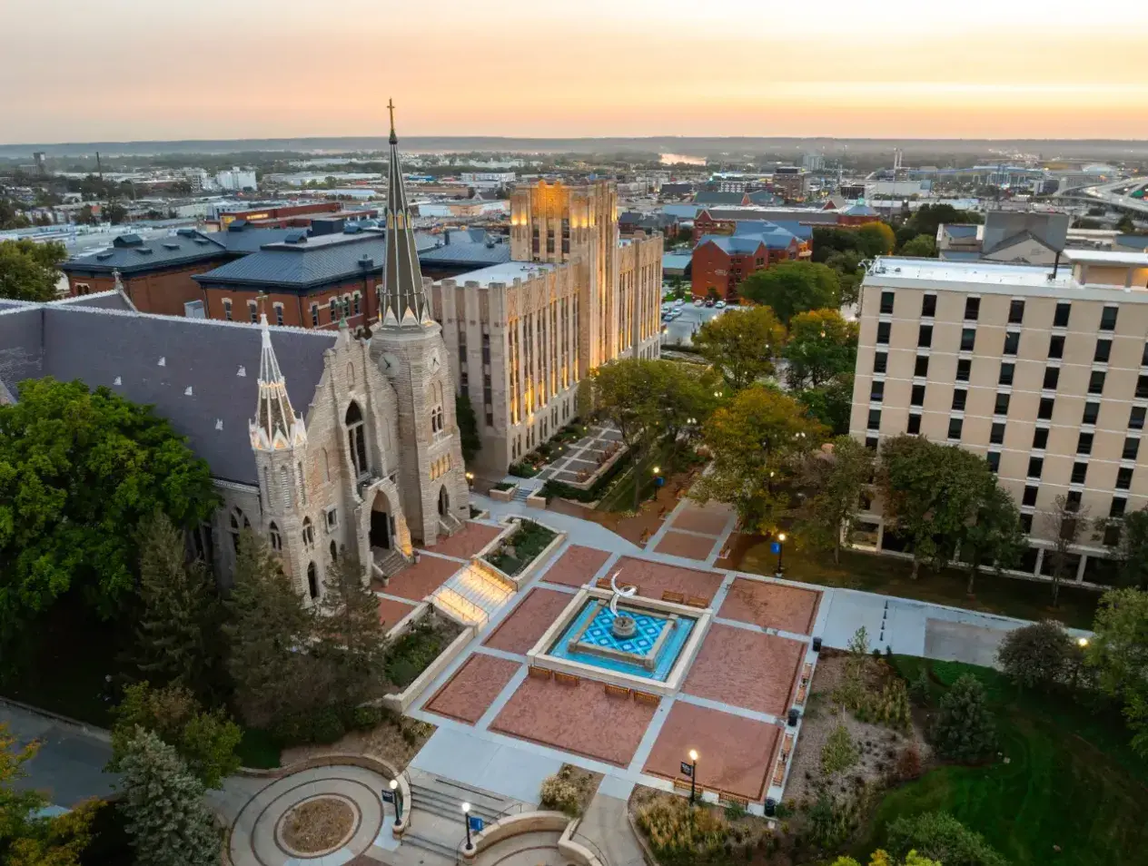 Drone panorama of Creighton campus at daybreak.