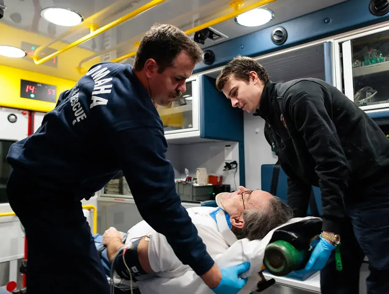 Paramedics working on patient.