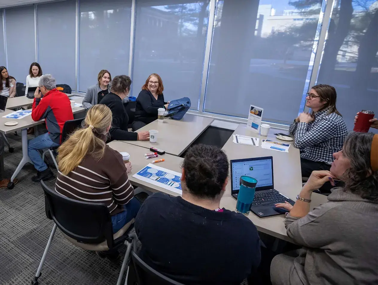 Creighton faculty working at a table