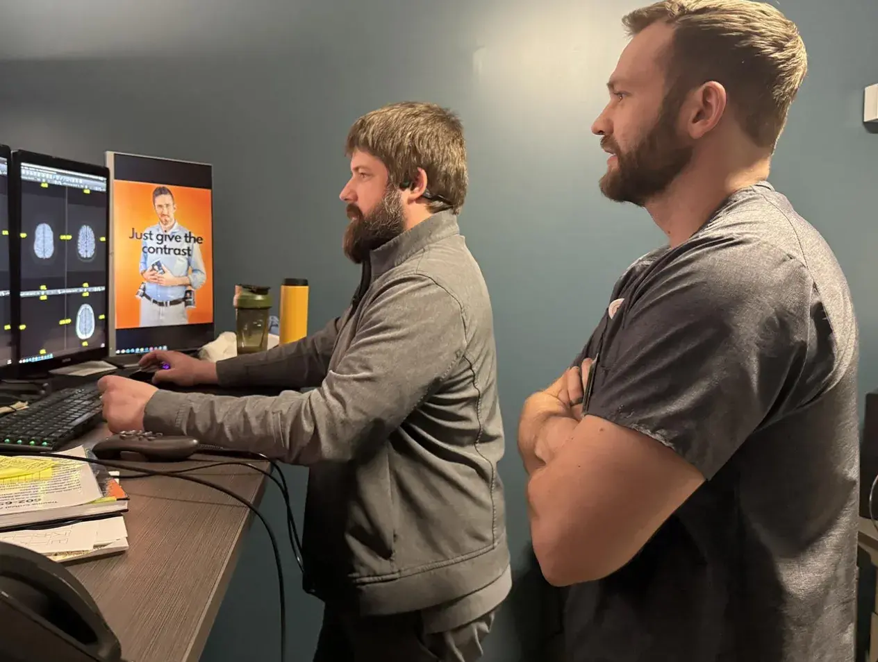 Professor with Student working with radiology images 