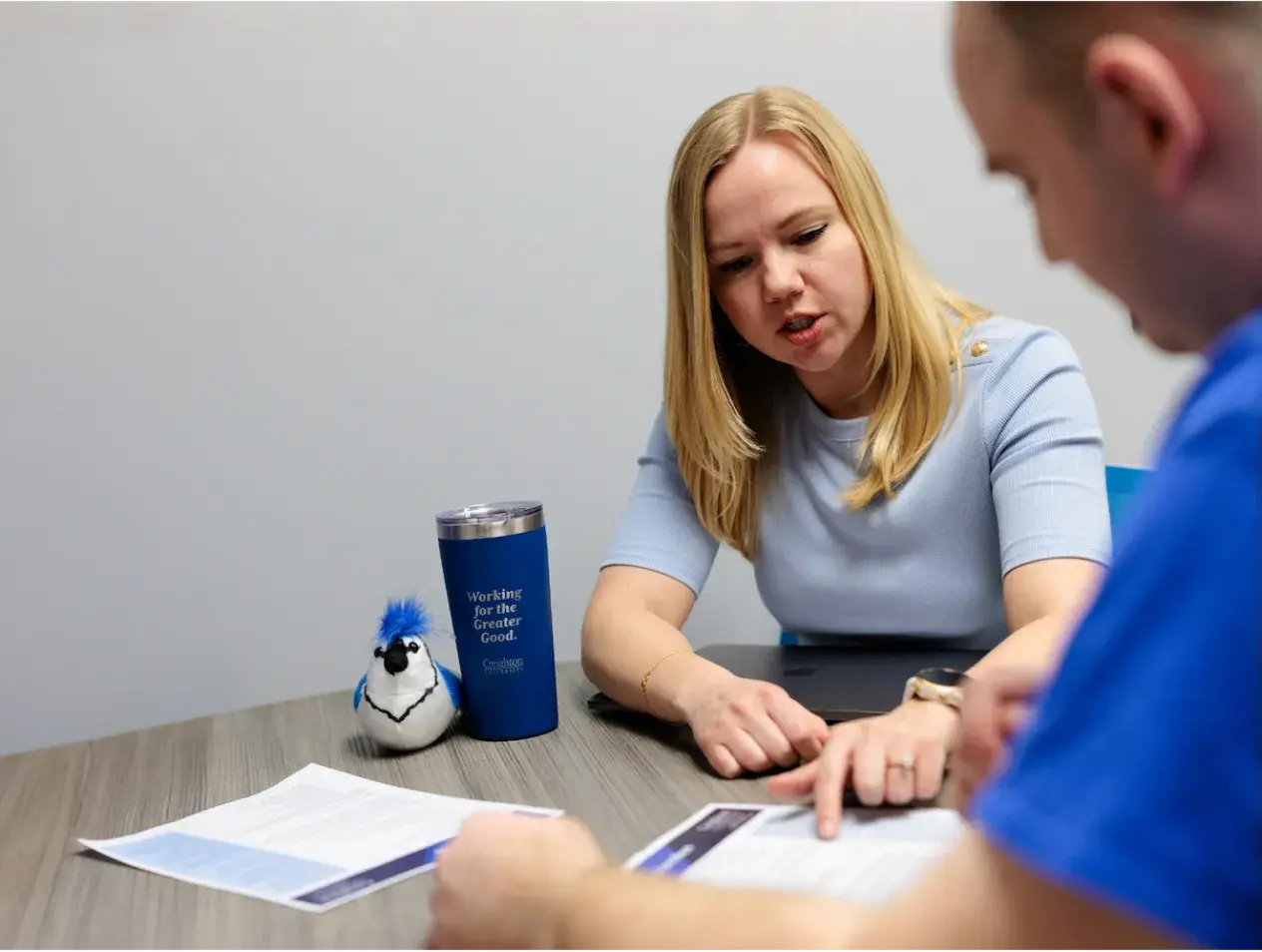 Advisor working with student