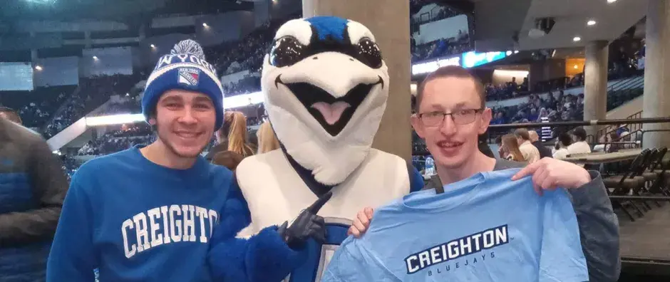 C.J. Braccia and friend with Billy Bluejay