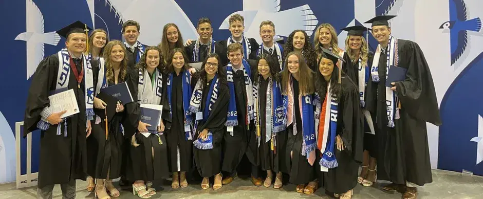 Abby Kleespie at commencement with fellow graduates