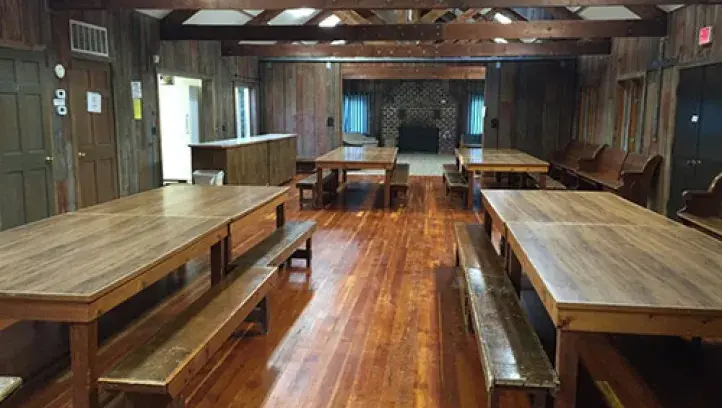 Large wooden tables in dining area