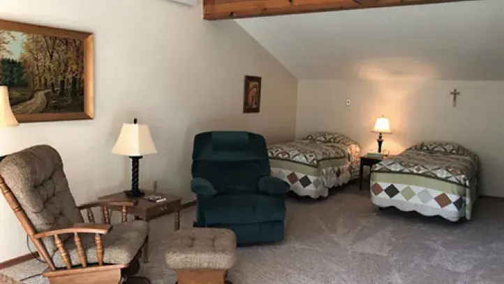 Lalemont living area with beds