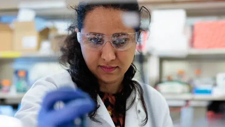 Woman at Creighton in research lab.