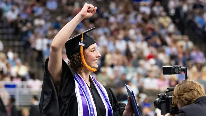 Student graduating at Creighton commencement.