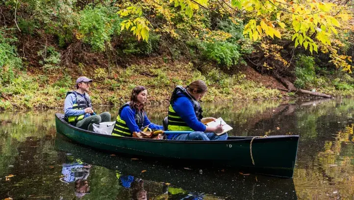 Research team examining water passage.