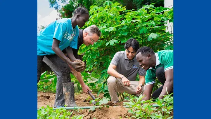 Creighton Africa Trip Planting Tree
