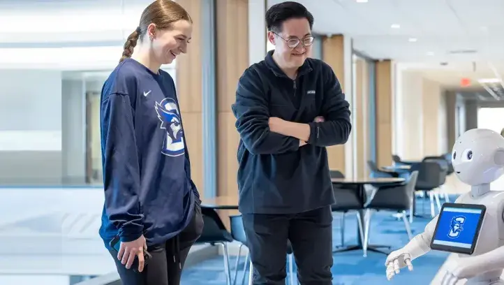 Pepper the Robot with students at Creighton.