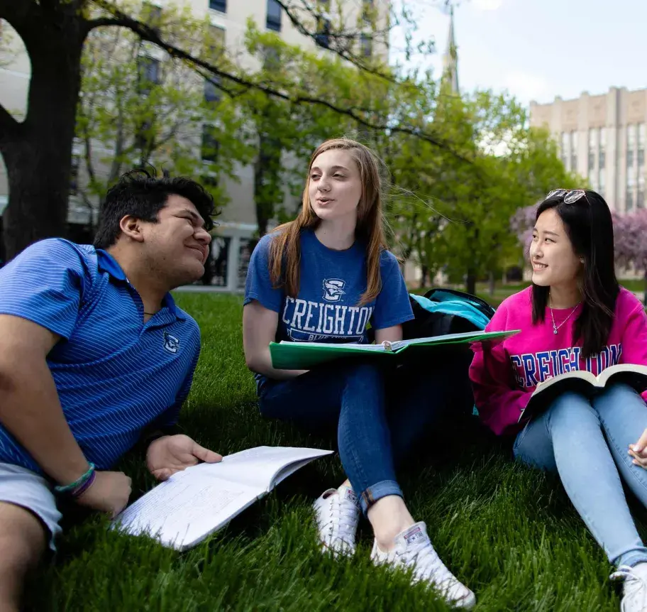Students gathering outdoors on Creighton campus