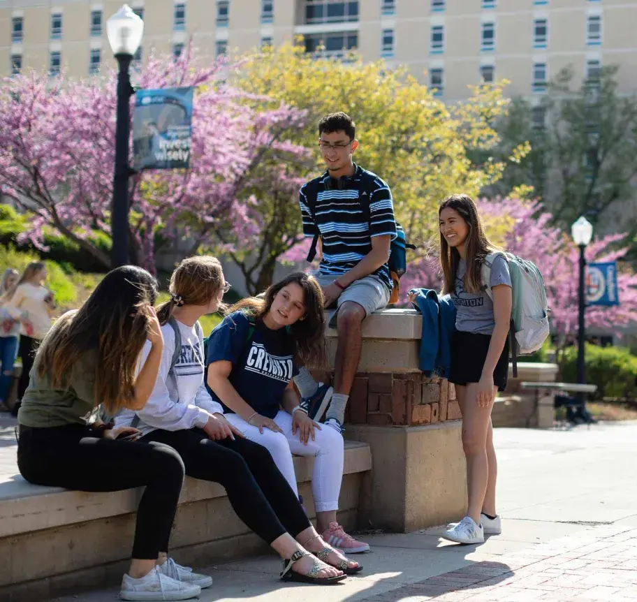 Students gathering outdoors on Creighton campus