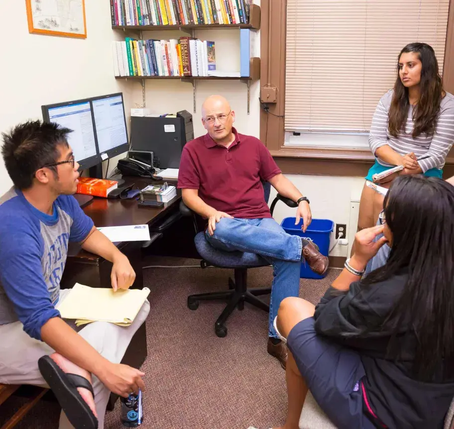 Faculty in conversation with students