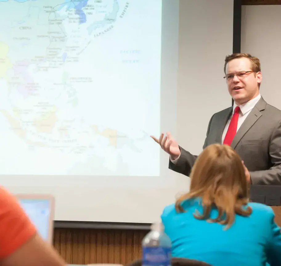 Faculty speaking in classroom