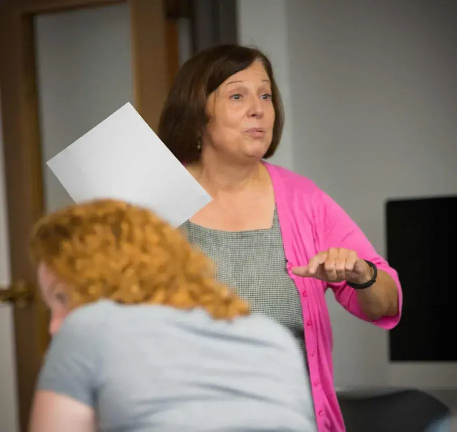 Faculty teaching in classroom with students