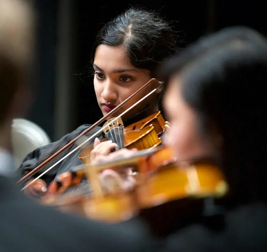 Student playing violin