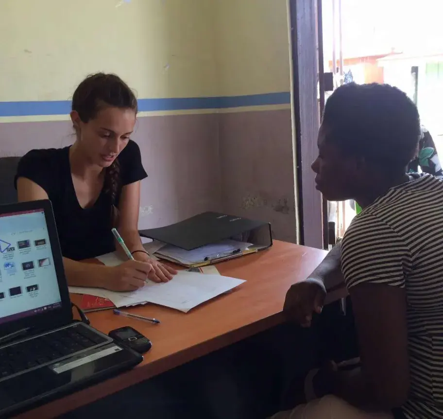 Social worker in conversation with client