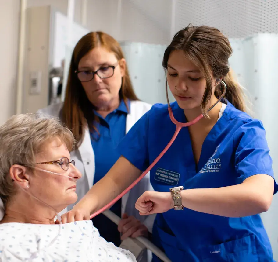 Student nurse in BSN program using stethescope