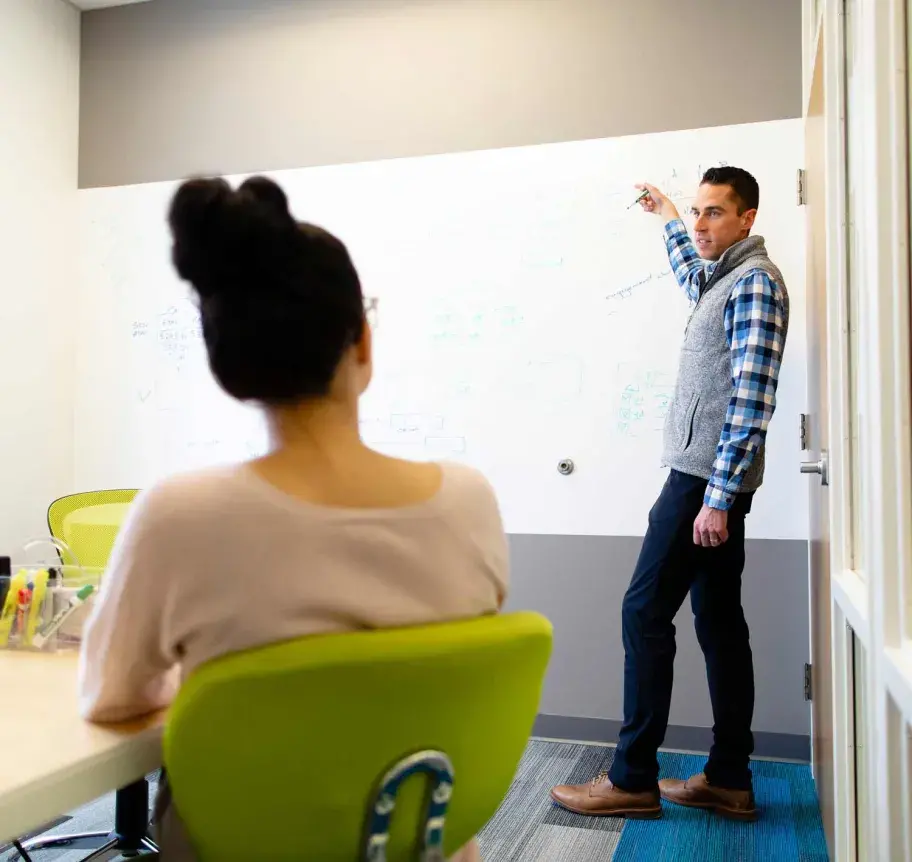 Faculty teaching in classroom setting