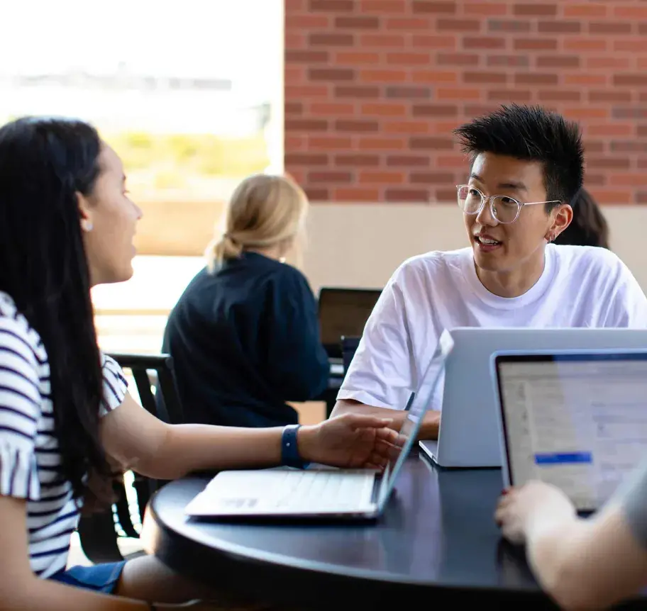 Creighton students studying outdoors