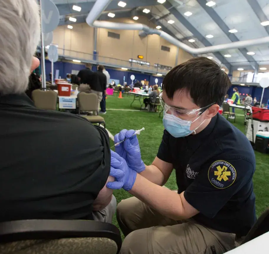 EMS students participating in COVID-19 vaccine clinic