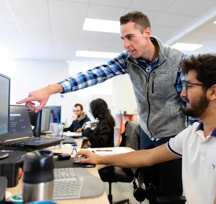 Students working together at computer