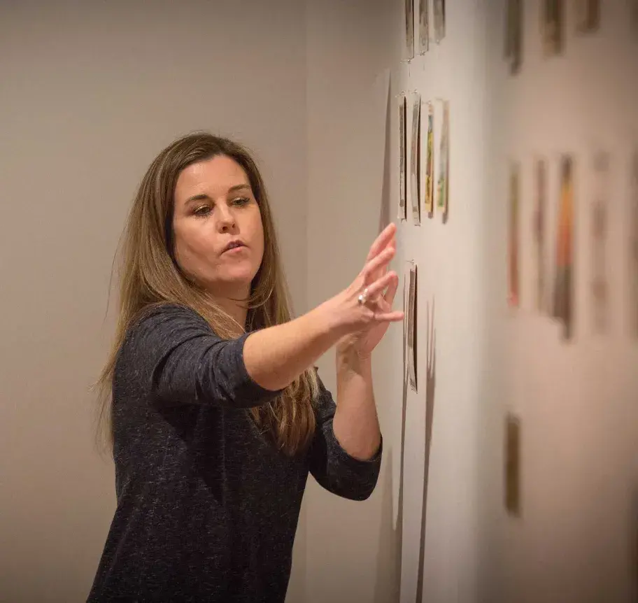 Art faculty teaching in classroom