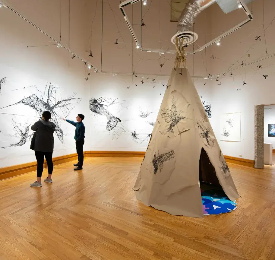 Student and parent in art gallery