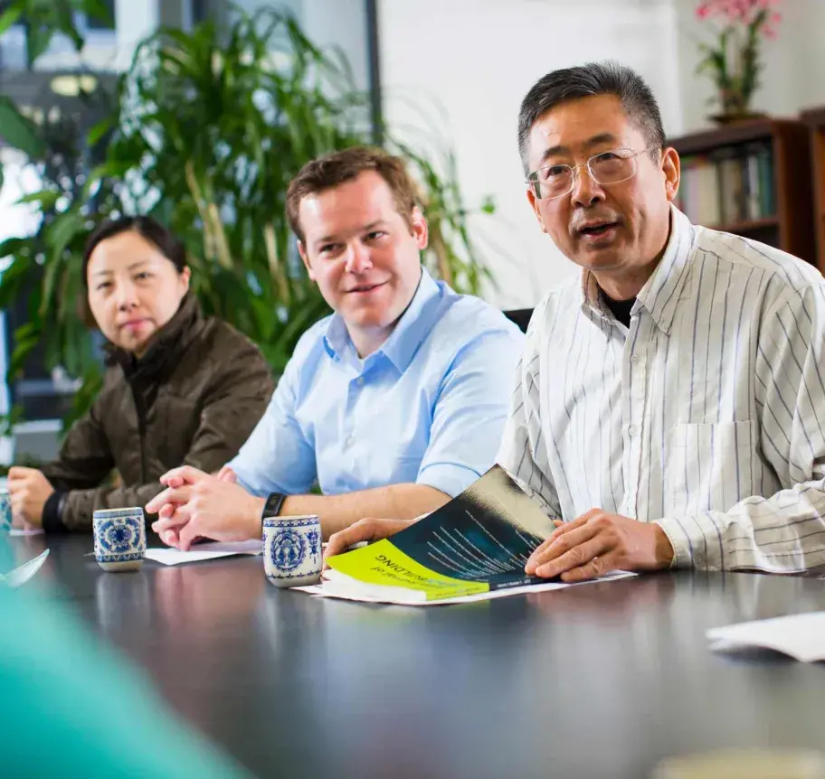 Faculty in meeting at Creighton