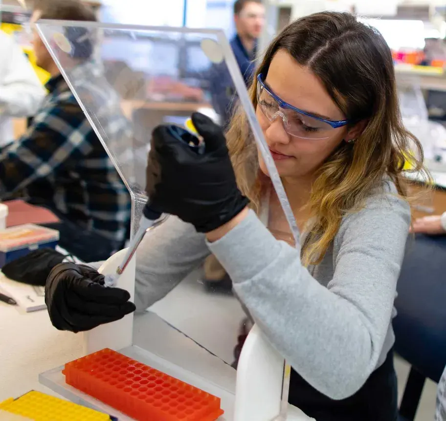 Student working in science lab