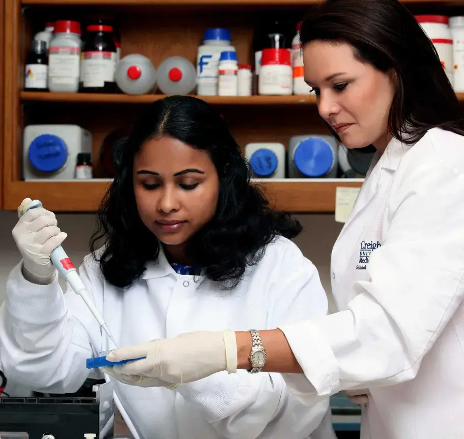 Faculty and student working together in lab