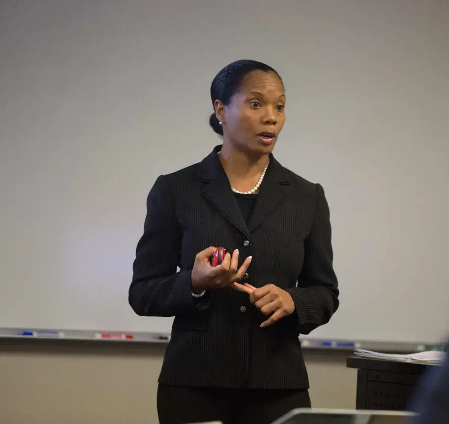 Faculty teaching students in classroom
