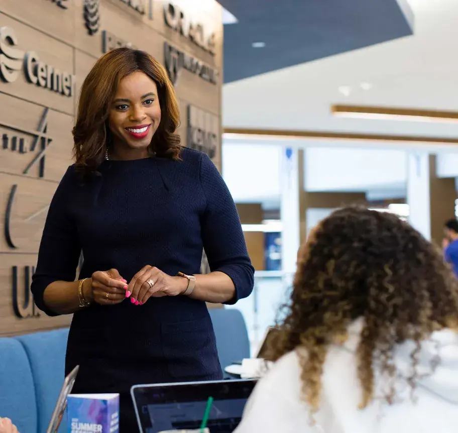 Faculty engaging with students in Heider College of Business