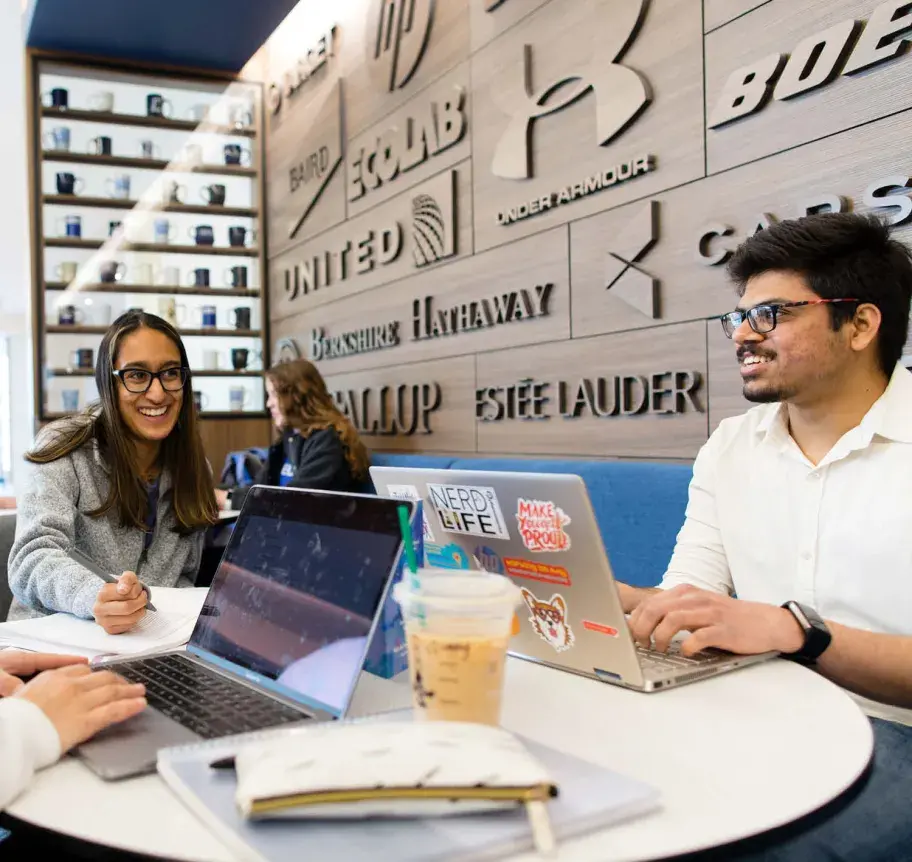 Business students using laptops at Heider College of Business