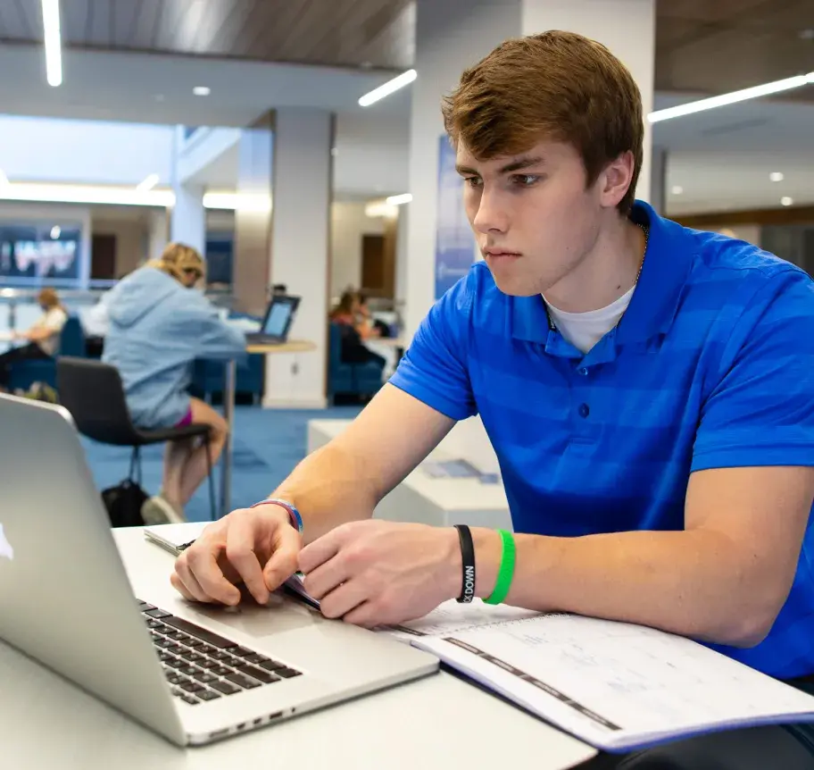 Student working on laptop
