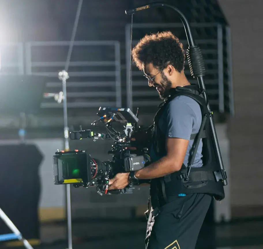 Film studies student using camera