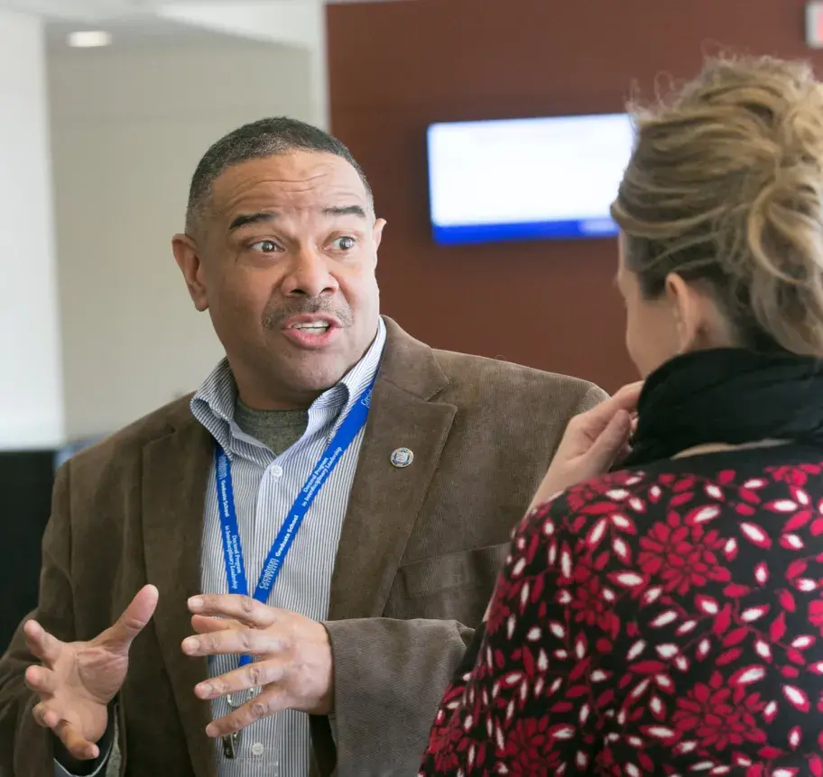 Leadership faculty and students in discussion