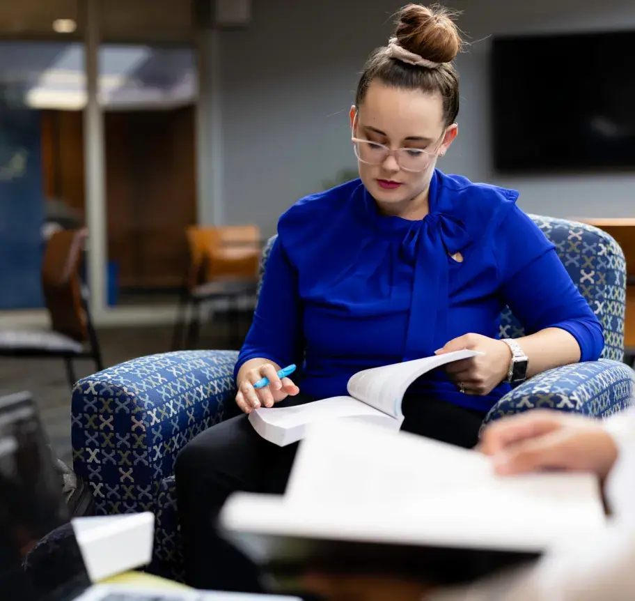 Leadership student reading book