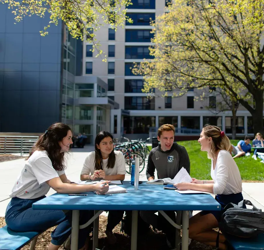 Students gathered outdoors on Creighton campus