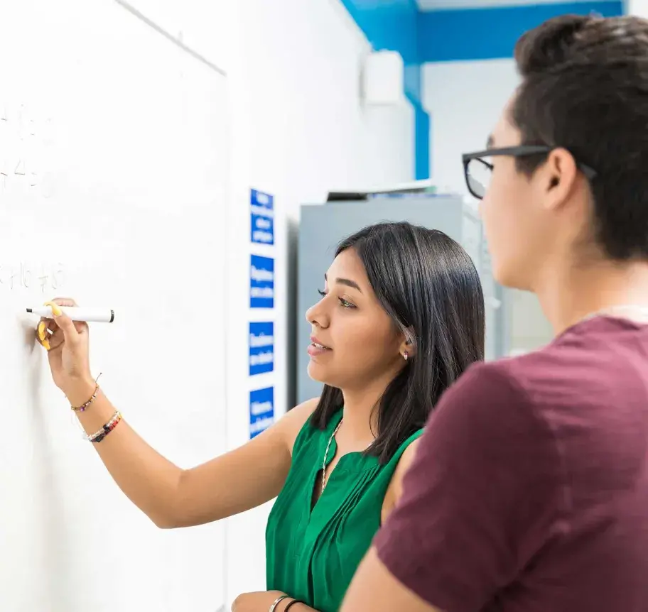 Students working on white board