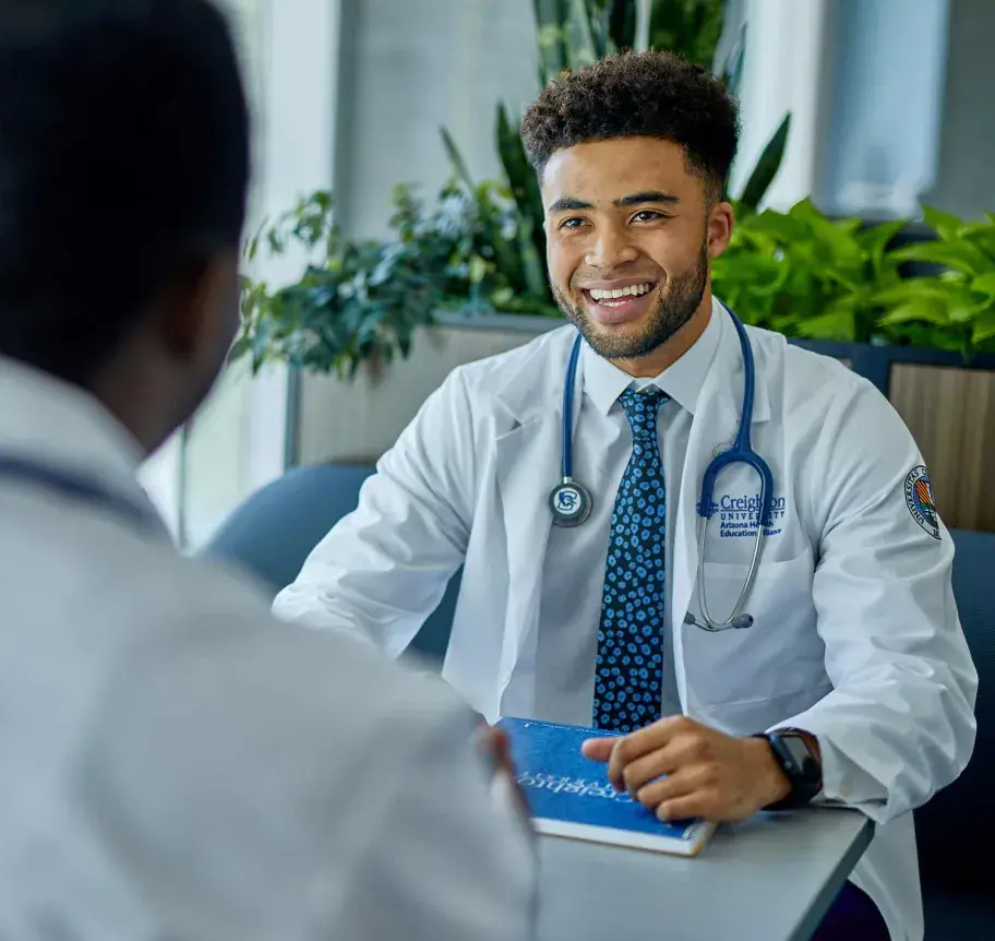 Physician assistand student meeting with faculty