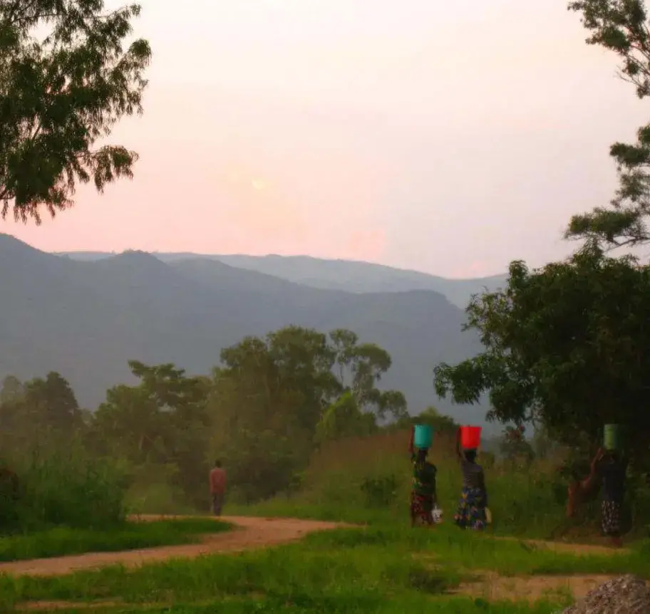 African landscape with women walking