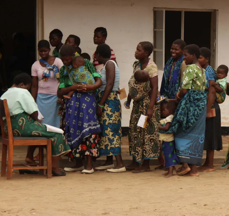 African people gathered outside of building