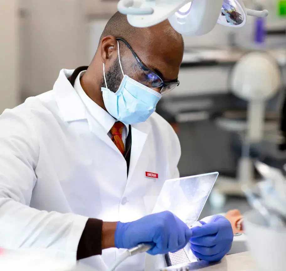 Dental student working in dentistry lab