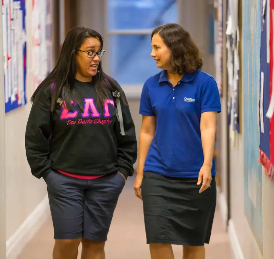 Academic advisor and student in discussion