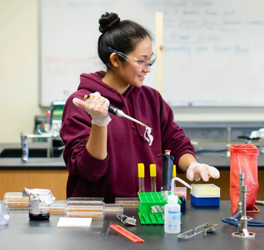 Creighton student working in lab