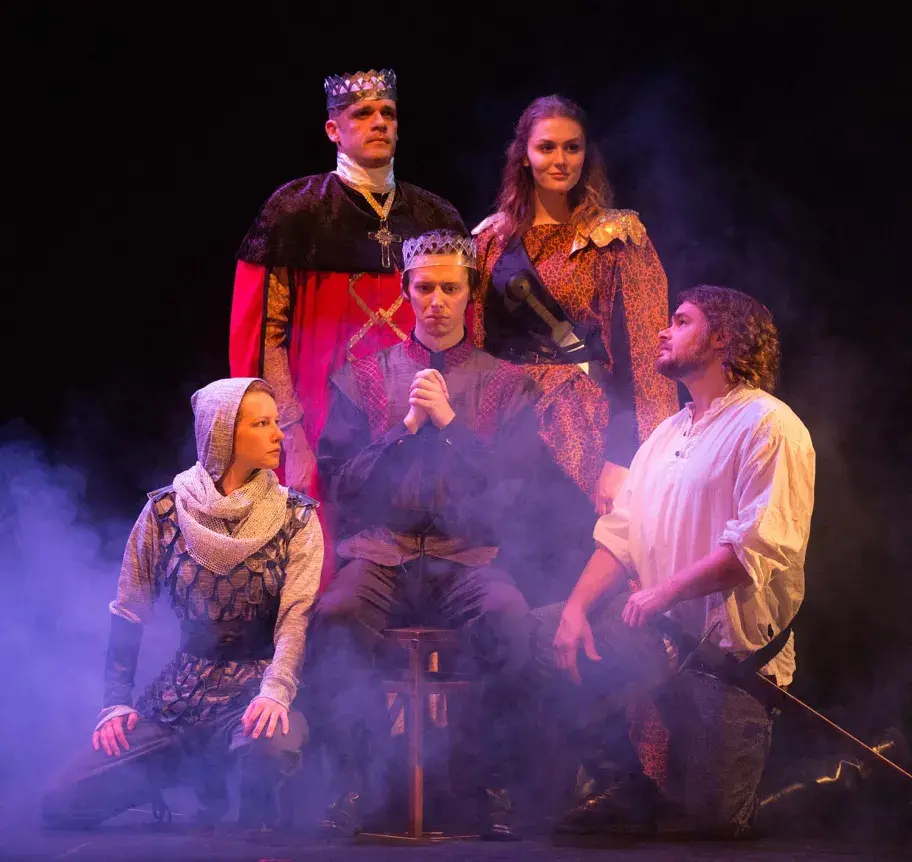 Theatre students performing on stage
