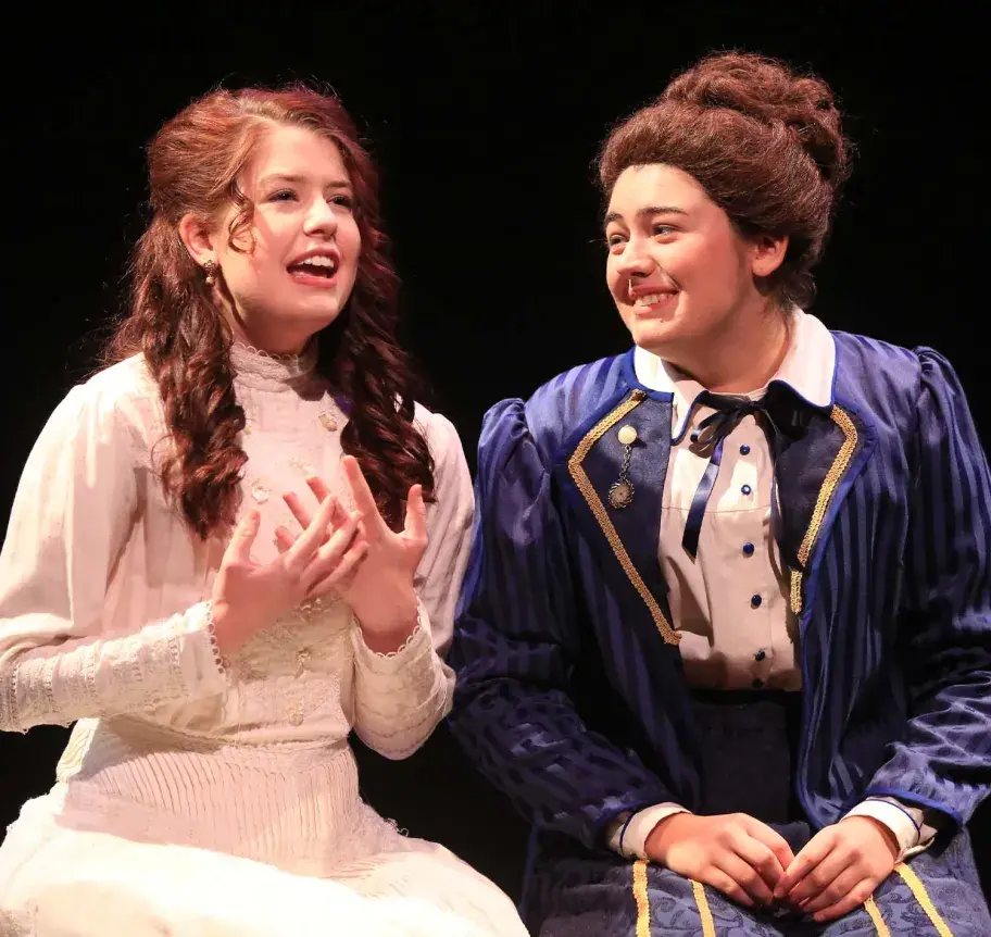 Theatre students performing on stage