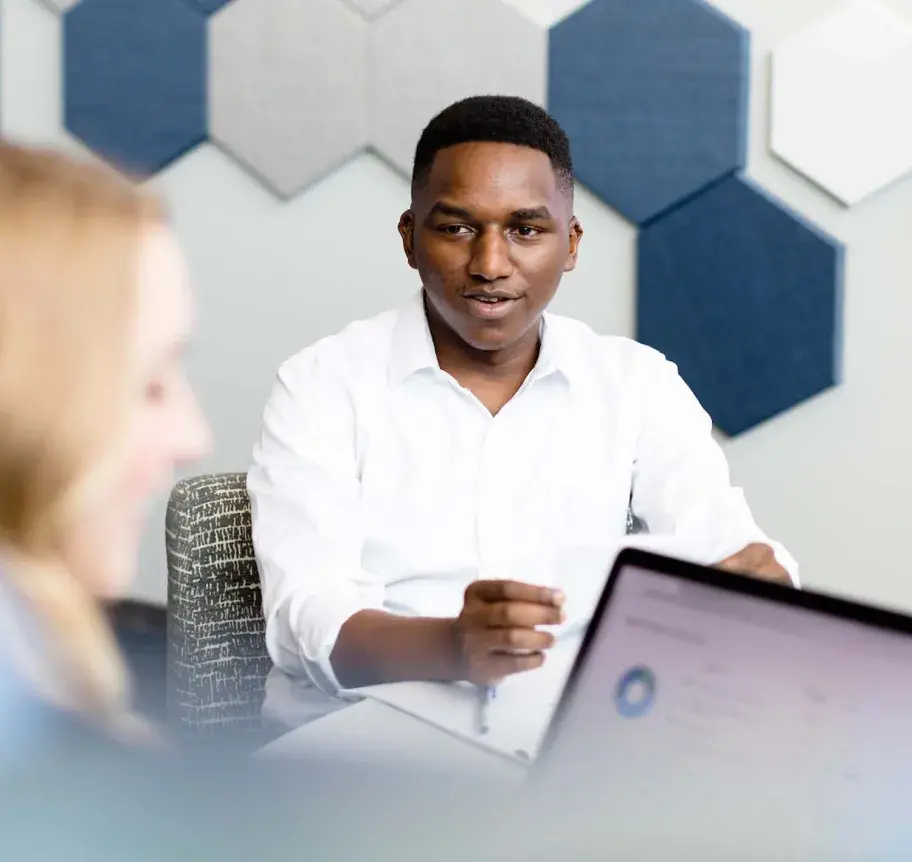 Business student collaborating with other students