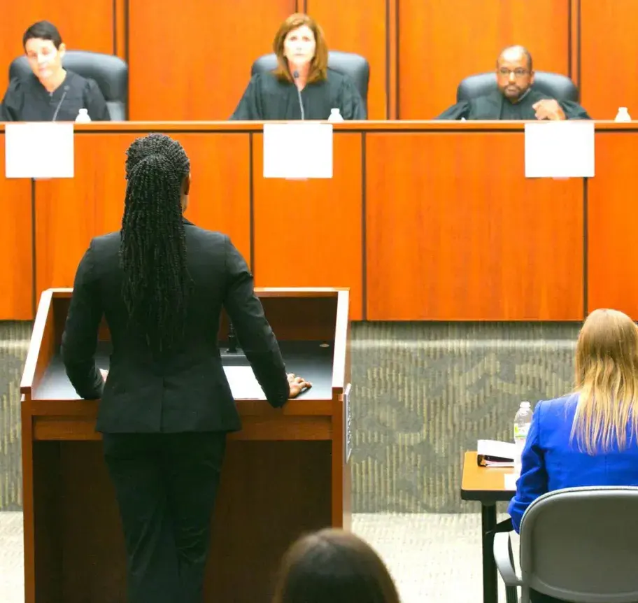 Creighton legal students in mock court environment.